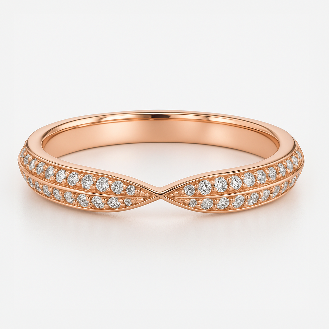 Rose gold wedding ring with diamond accents on a light background