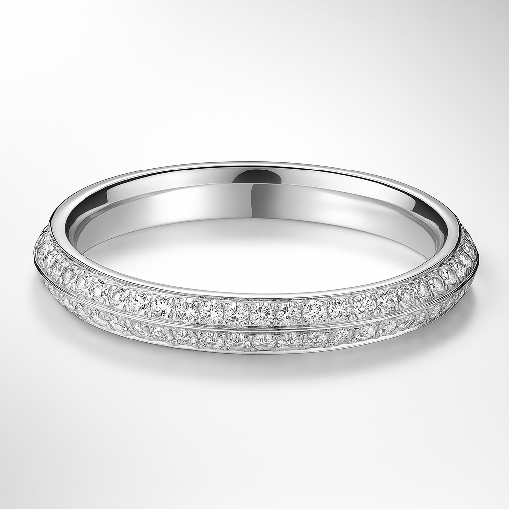 White gold wedding ring with diamond accents on a light grey background