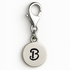 Silver charm with letter 'B' on a white background