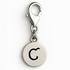 Silver charm with letter 'C' on a white background