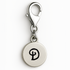 Silver charm with a black letter 'D' on a white background