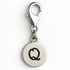 Silver charm with letter 'Q' on a white background