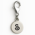 Silver charm with letter 'S' on a white background