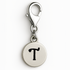 Silver charm with letter 'T' on a white background