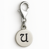 Silver charm with letter 'u' on a white background