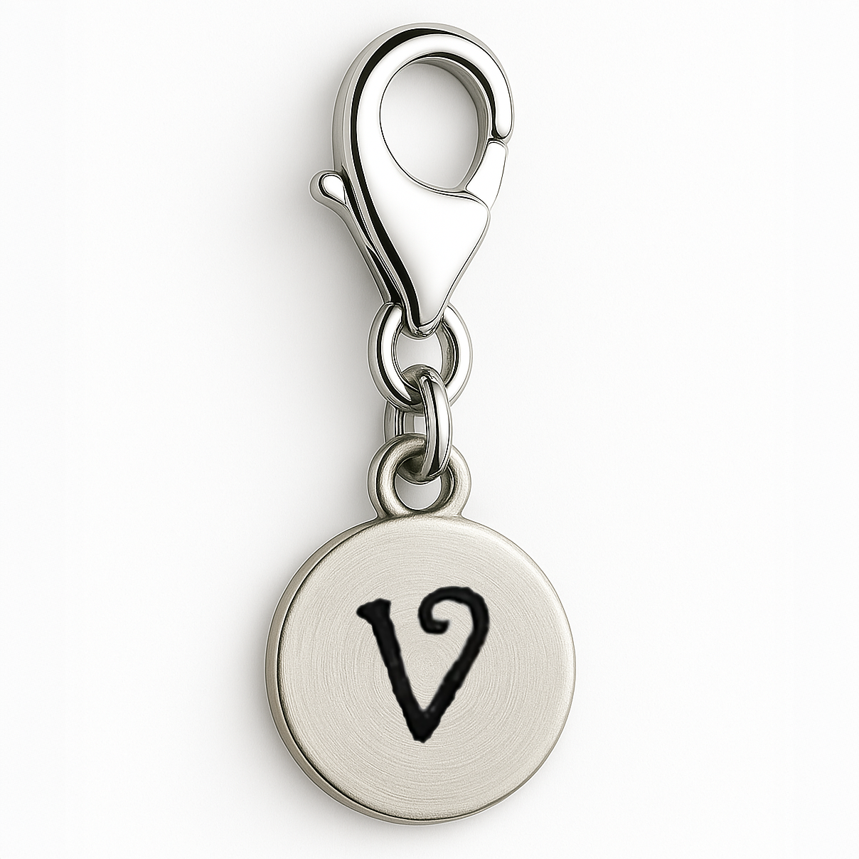 Silver charm with a black letter 'V' on a white background