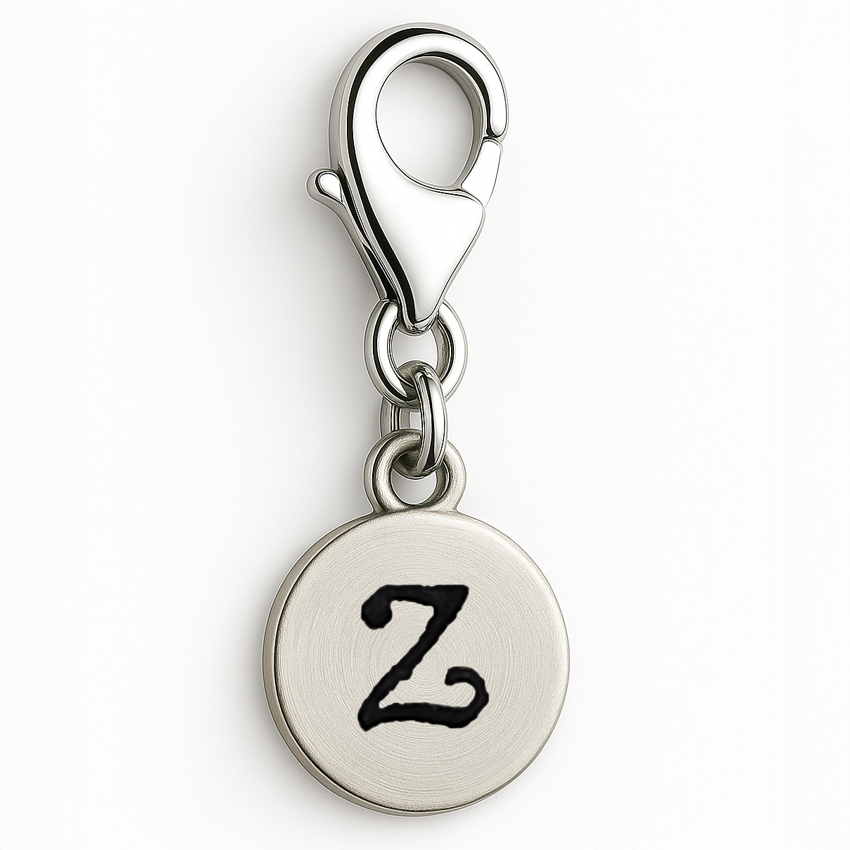 Silver charm with letter 'Z' on a white background