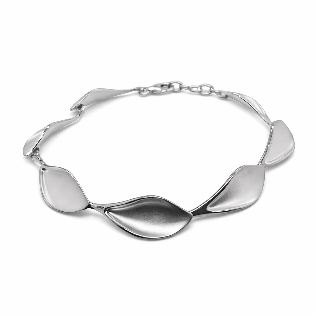 Silver bracelet with leaf-shaped links on a white background