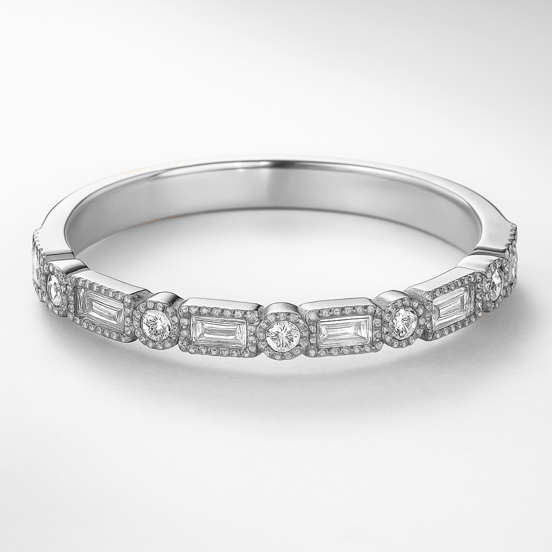 Platinum Diamond ring with baguette and round cut diamonds on a white background