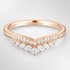 Rose Gold Shaped Tiara Wedding Ring on a Grey Background