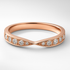 Rose gold wedding ring with diamonds on a light grey background