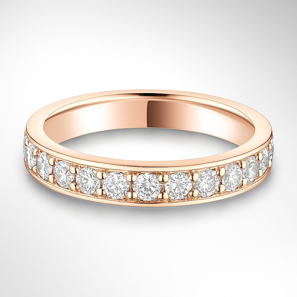 Rose gold ring with diamonds on a light grey background