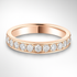 Rose gold ring with diamonds on a light grey background