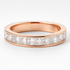 Rose gold ring with diamond stones on a white background
