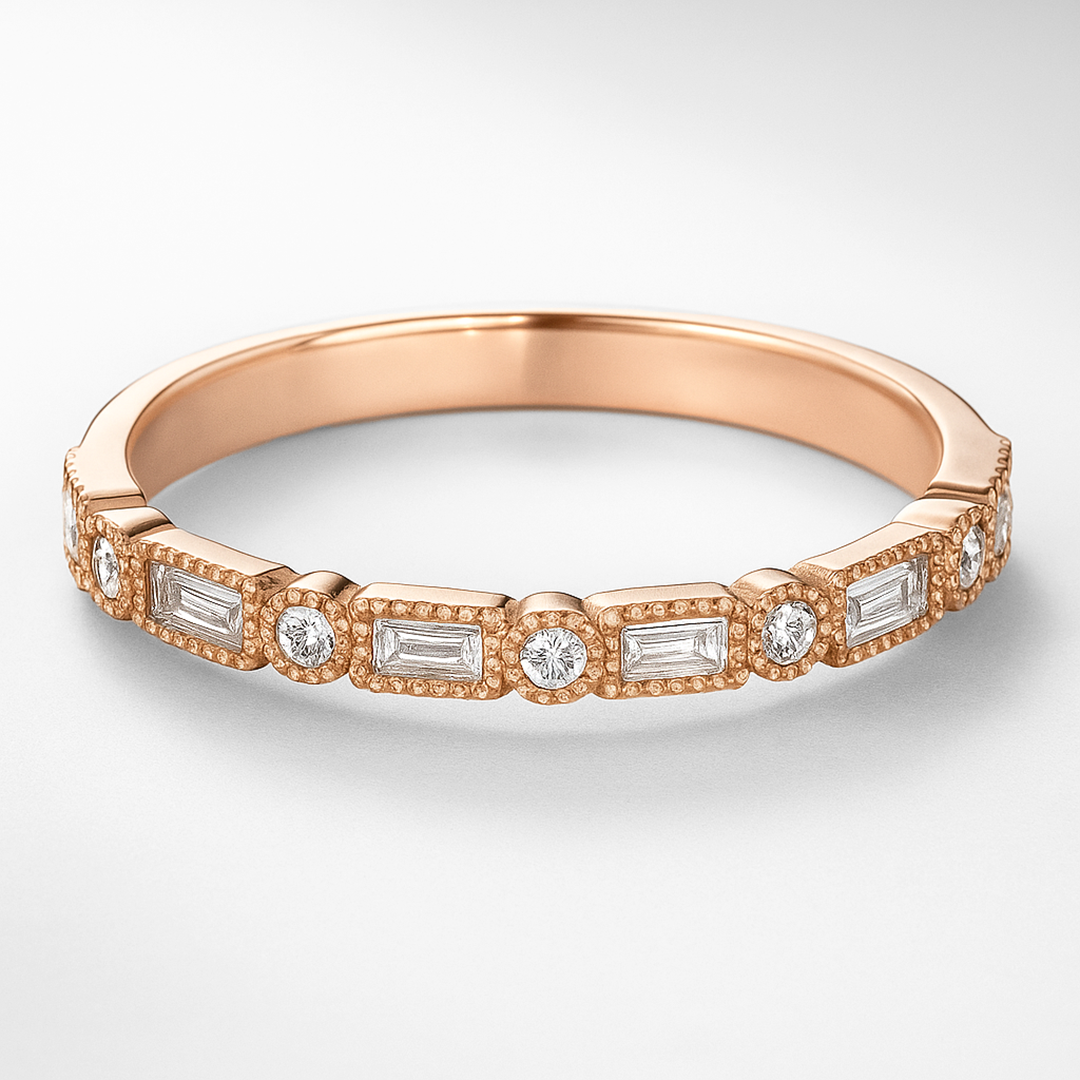 Rose gold ring with diamond accents on a light gray background