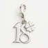 Silver charm with number 18 and clover leaf on a white background