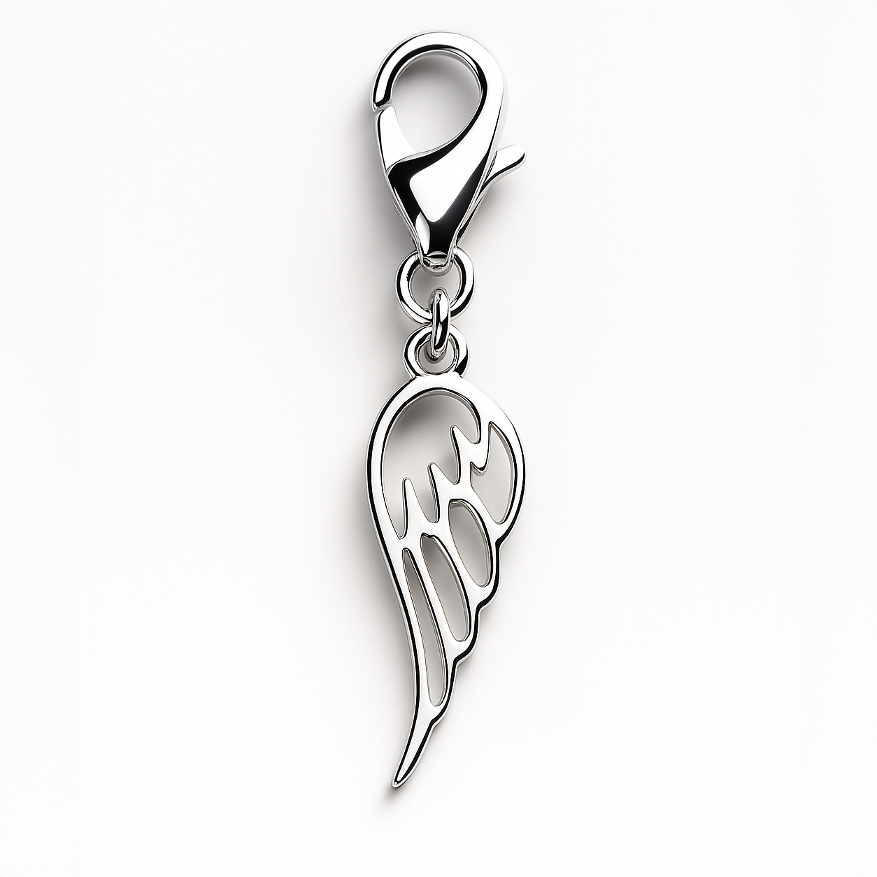Silver wing-shaped pendant on a white background