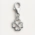 Silver four-leaf clover charm on a white background