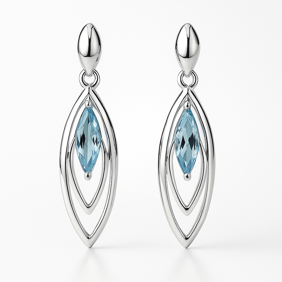 Silver earrings with blue gemstones on a white background