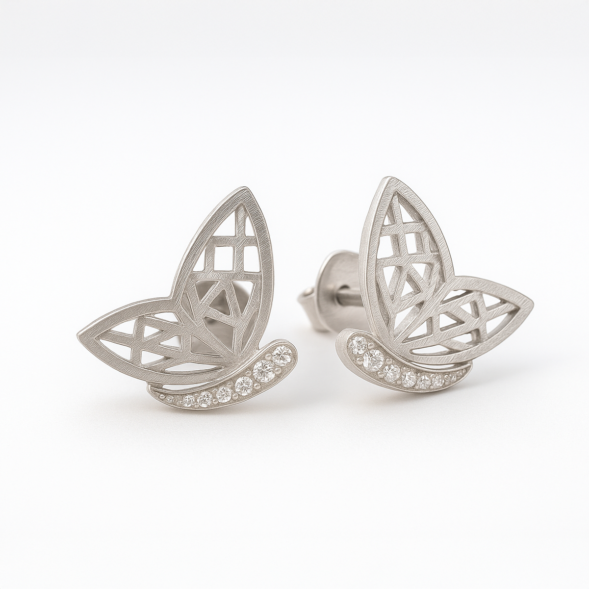 Silver Butterfly Stud Earrings on a White Background