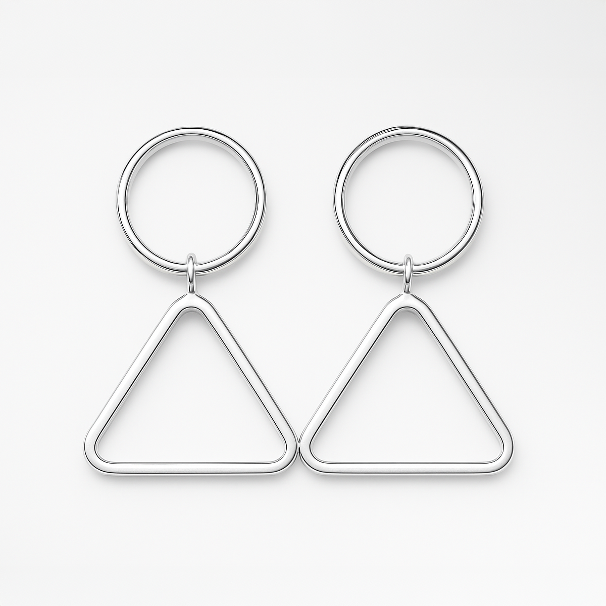 Silver Circle and Triangle Drop Earrings on a white background