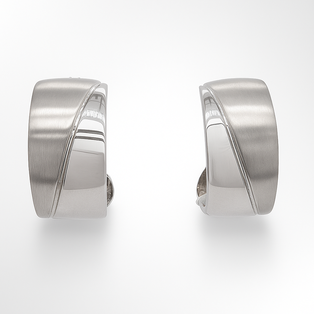 Pair of silver hoop earrings on a white background
