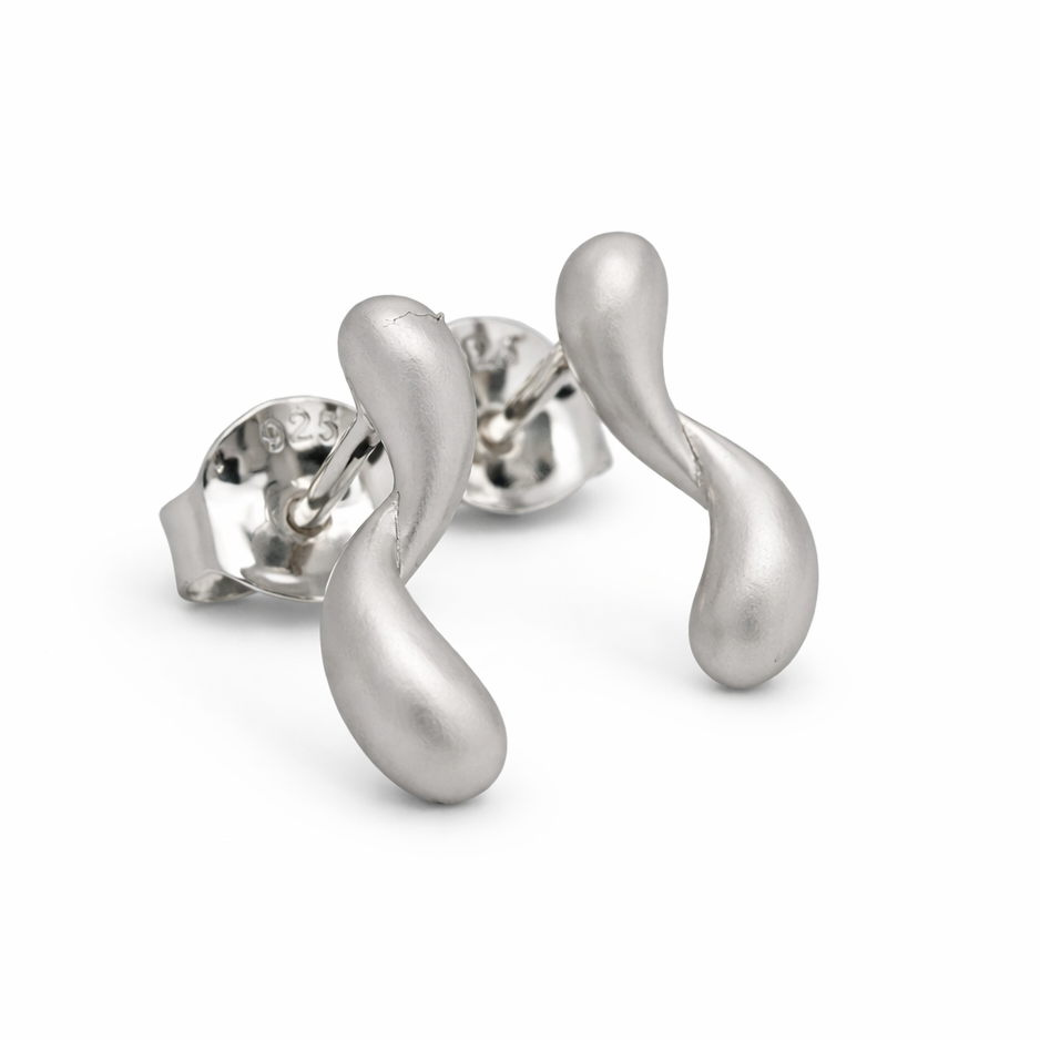 Silver earrings with a white background