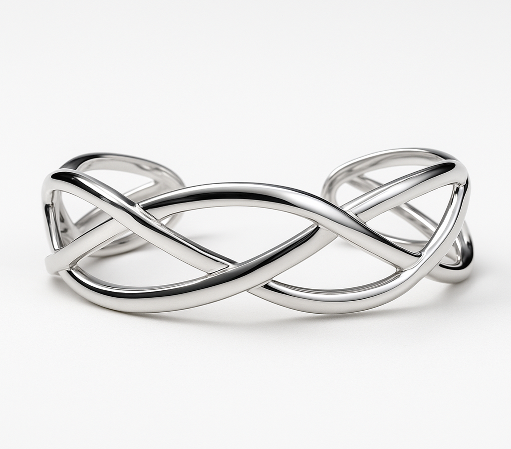 Silver Interwoven bangle on a white background