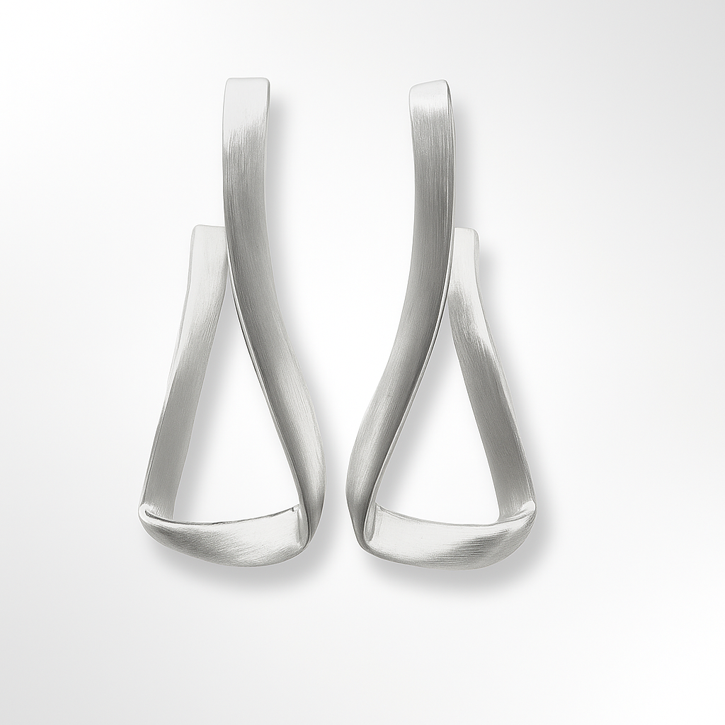 Pair of silver earrings on a white background