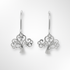 Pair of silver earrings with intricate designs on a white background