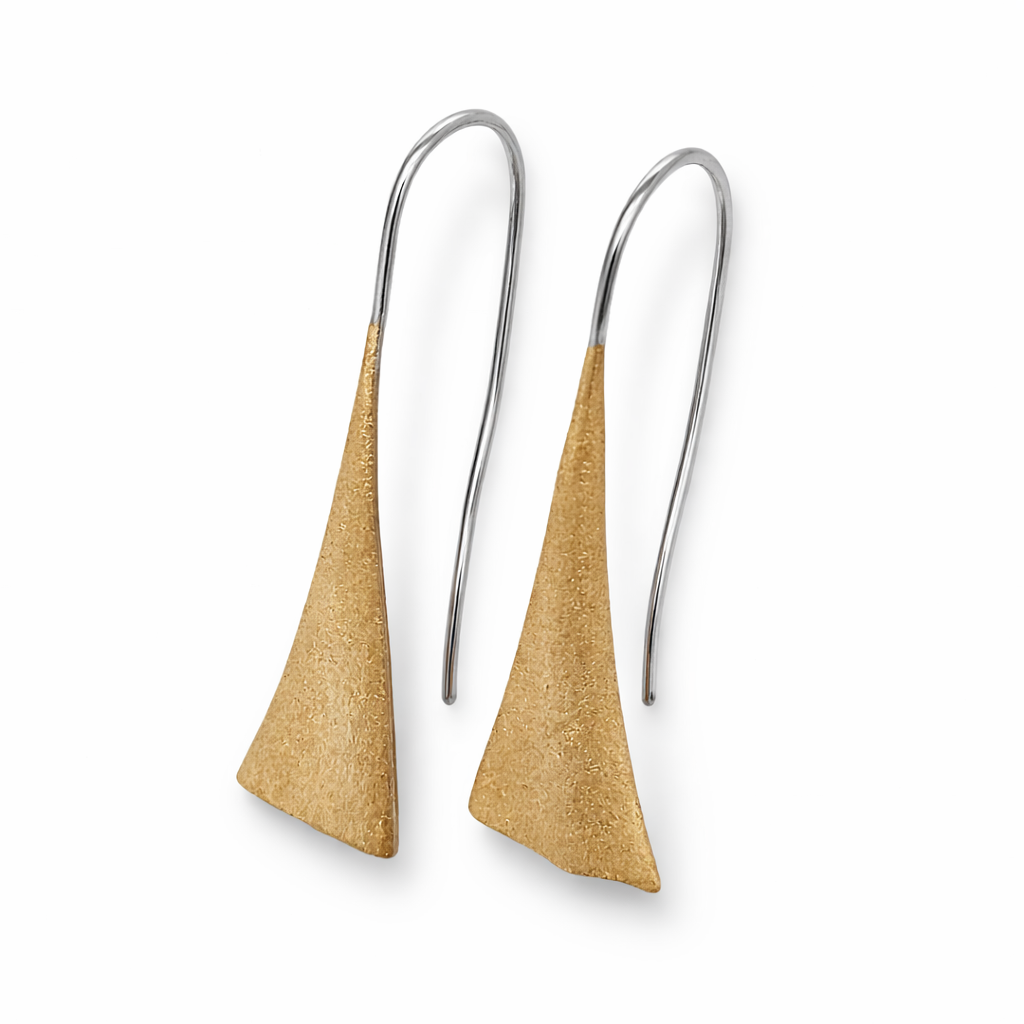 Gold triangle earrings with silver hooks on a white background