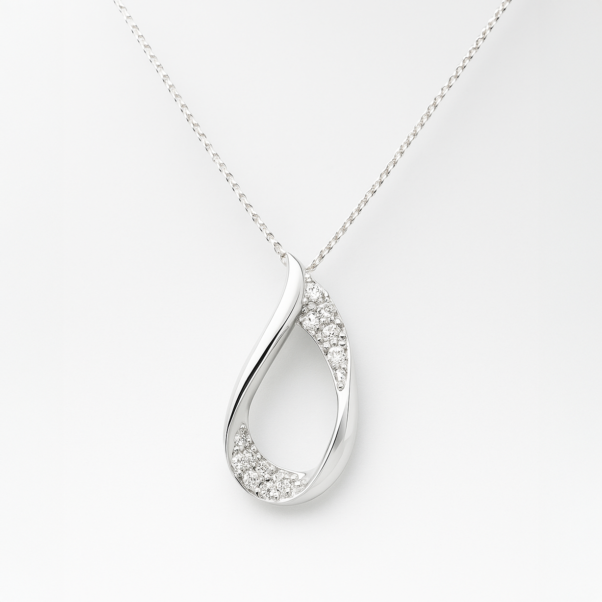 Silver Teardrop Shape Pendant and Chain on a white background