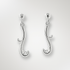 Pair of silver earrings on a light grey background