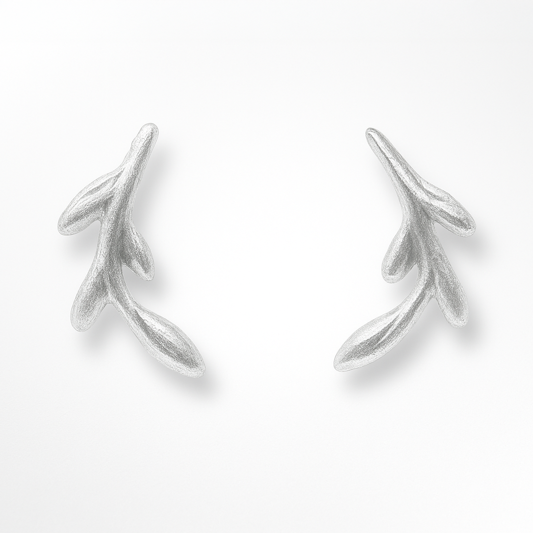 Silver branch-shaped earrings on a white background