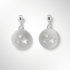 Pair of silver earrings with star designs on a white background