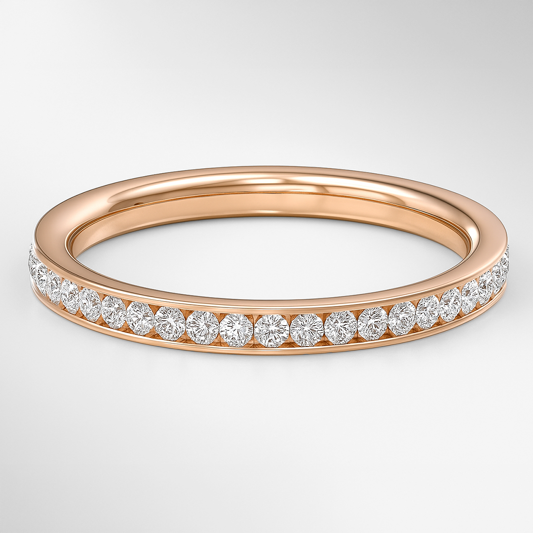 Rose gold ring with diamonds on a light gray background