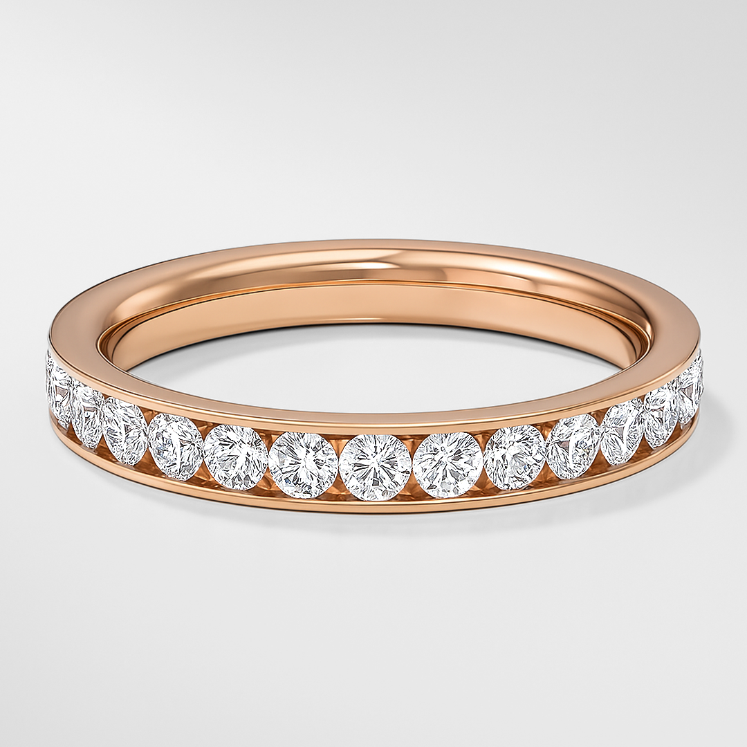 Rose gold ring with diamonds on a light gray background