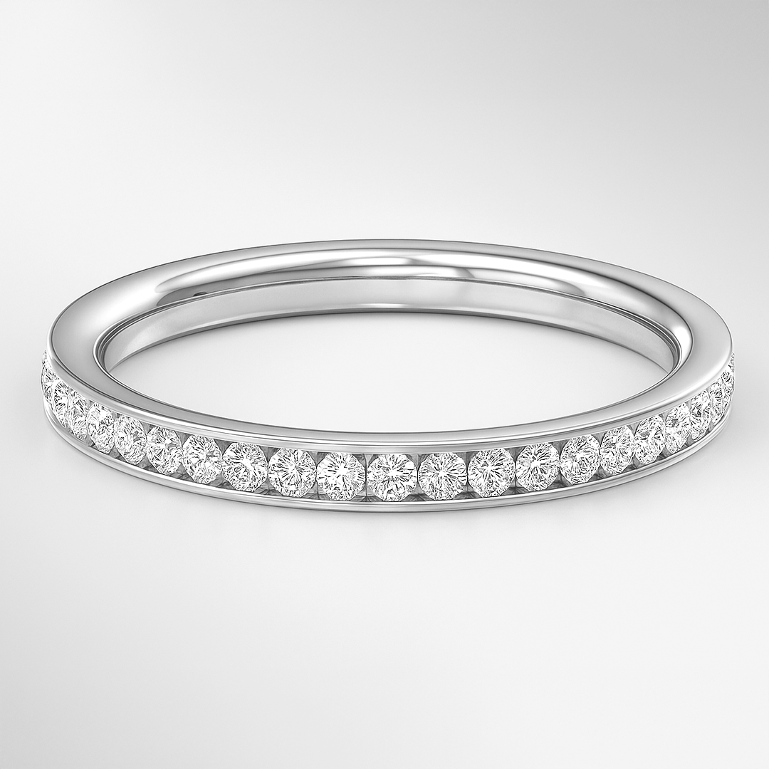 White Gold ring with small diamonds on a light gray background