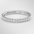 White Gold ring with small diamonds on a light gray background