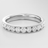 White Gold ring with small diamonds on a light gray background