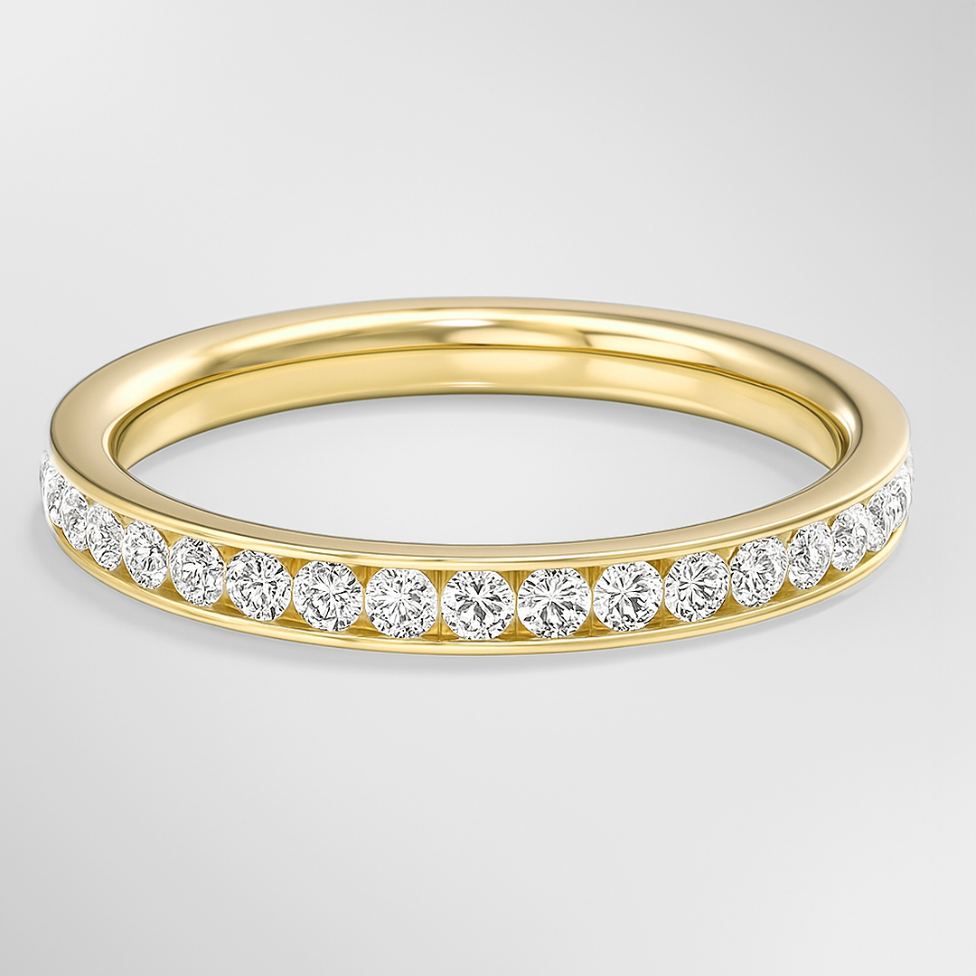 Gold ring with diamonds on a light gray background