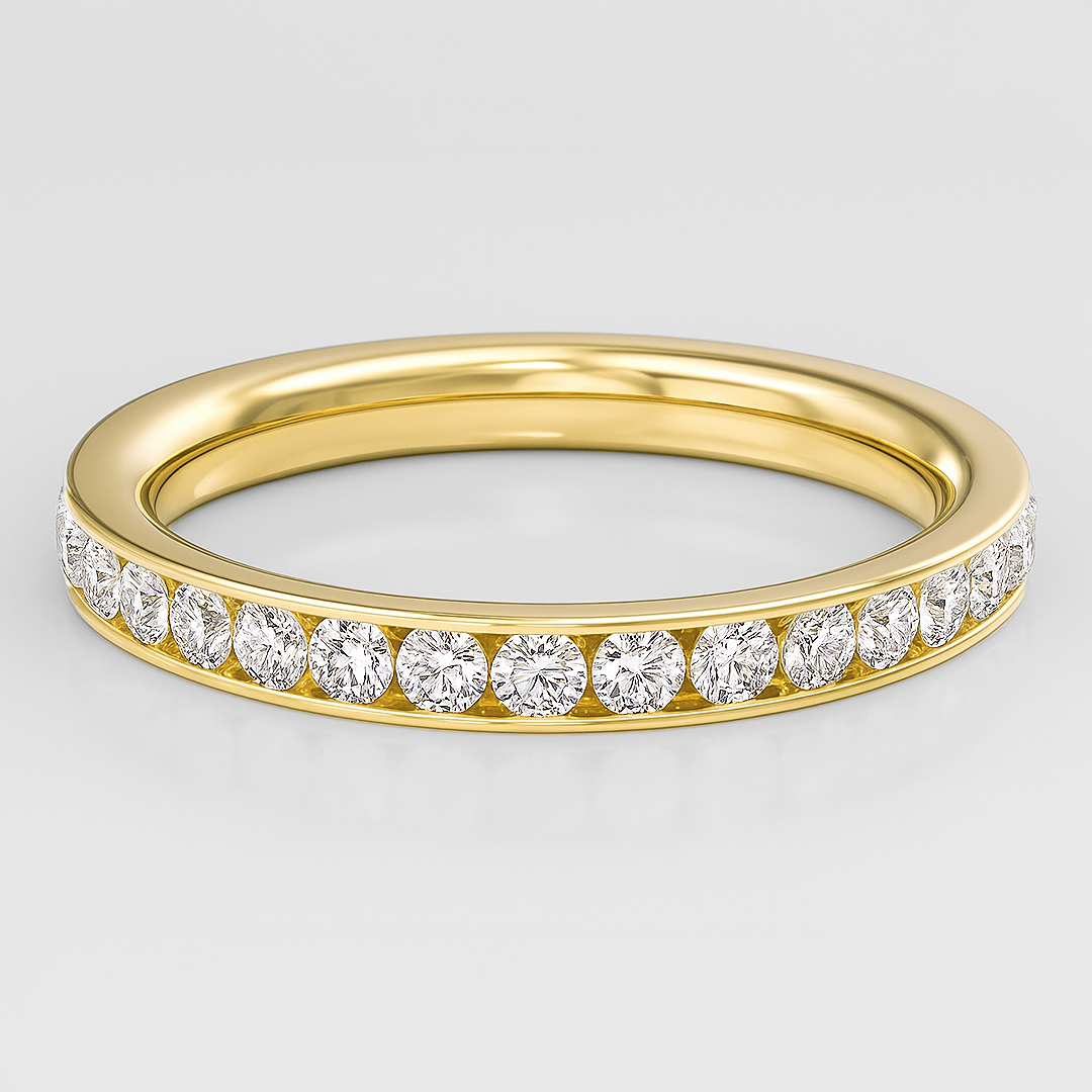 Gold ring with diamonds on a light gray background