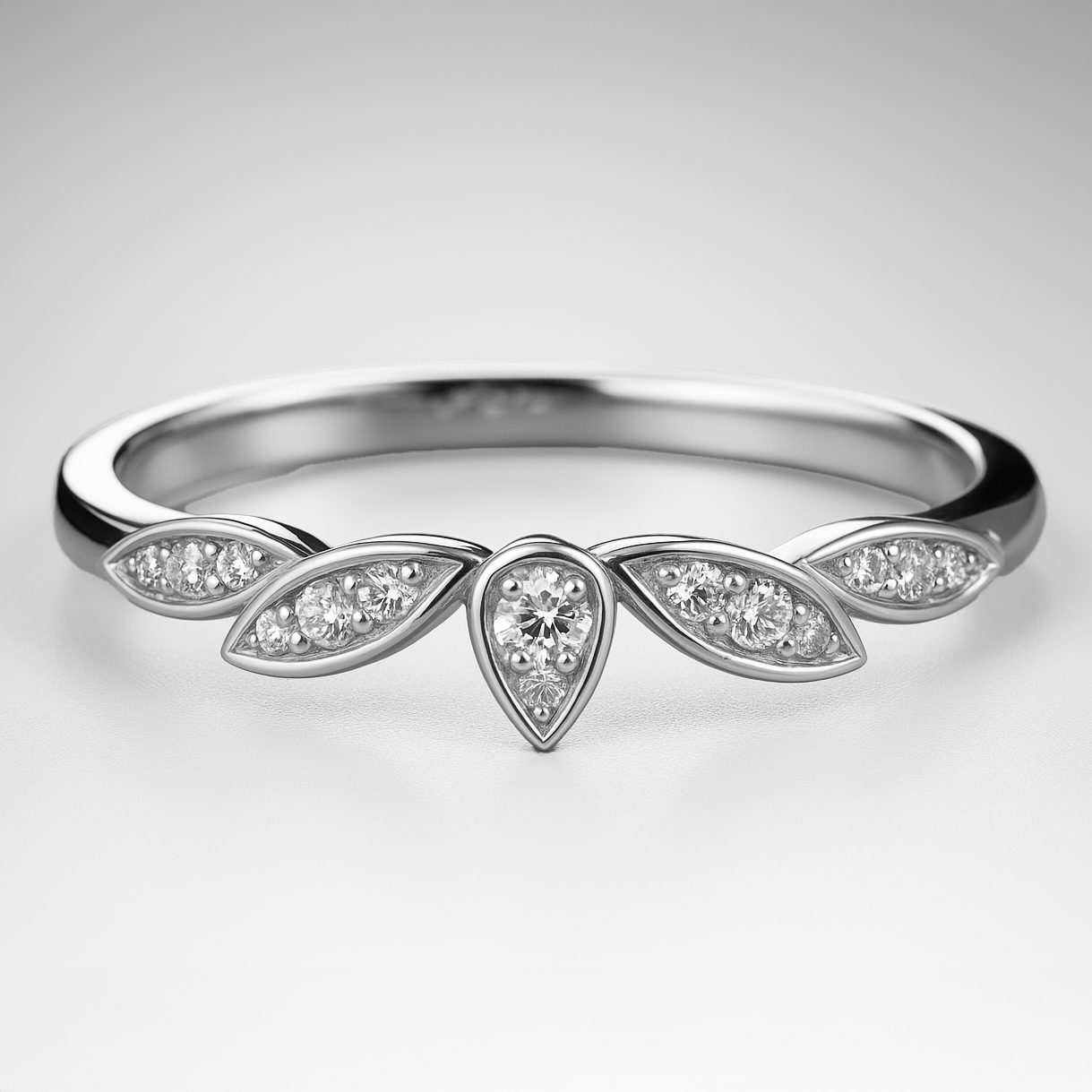 White Gold Floral Wedding Ring with Diamond Accents on a grey background
