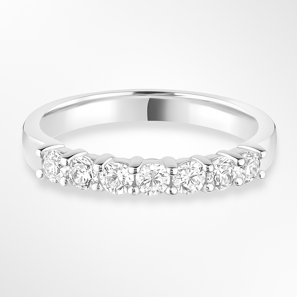 White gold wedding ring with diamonds on a white background