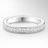 White gold wedding ring with small diamonds on a light grey background