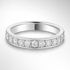 White gold wedding ring with small diamonds on a light grey background