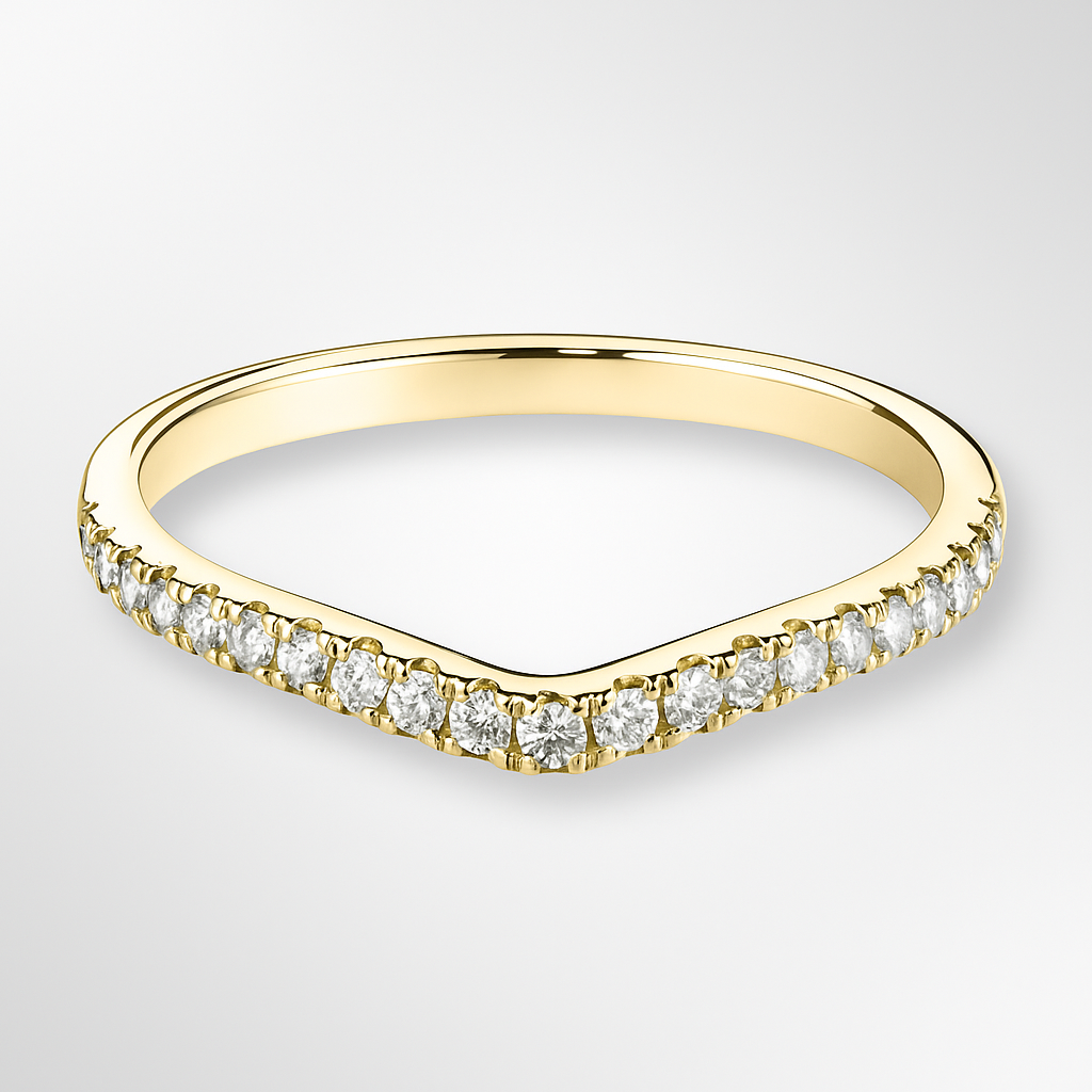 Yellow Gold ring with diamond stones on a light grey background