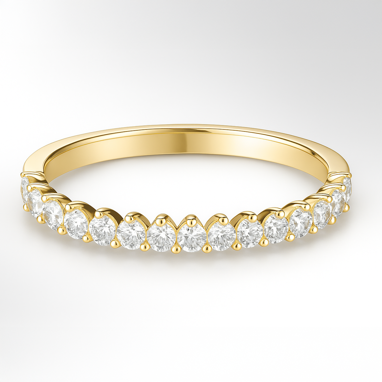 Yellow Gold Three Claw Diamond Wedding Ring on a White Background
