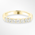 Gold wedding ring with diamonds on a white background
