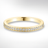 Gold wedding ring with diamonds on a white background